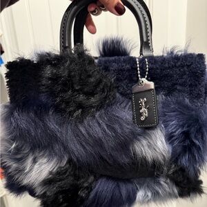 Coach shearling rogue 25